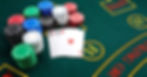 poker chips and four aces on a casino table, example of suited connectors risk